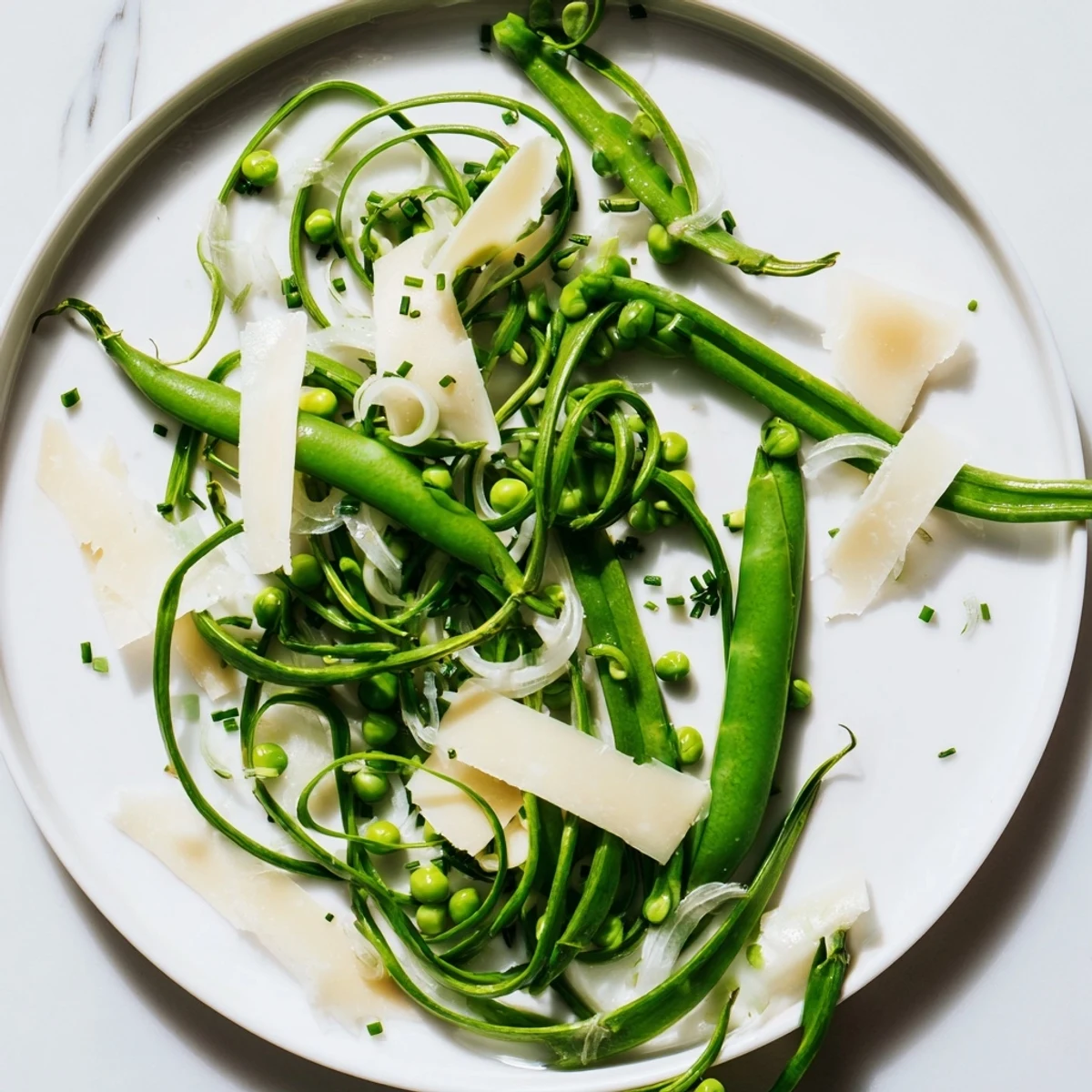 A fresh, bright English Ivy salad featuring crisp green beans and a light lemon vinaigrette.