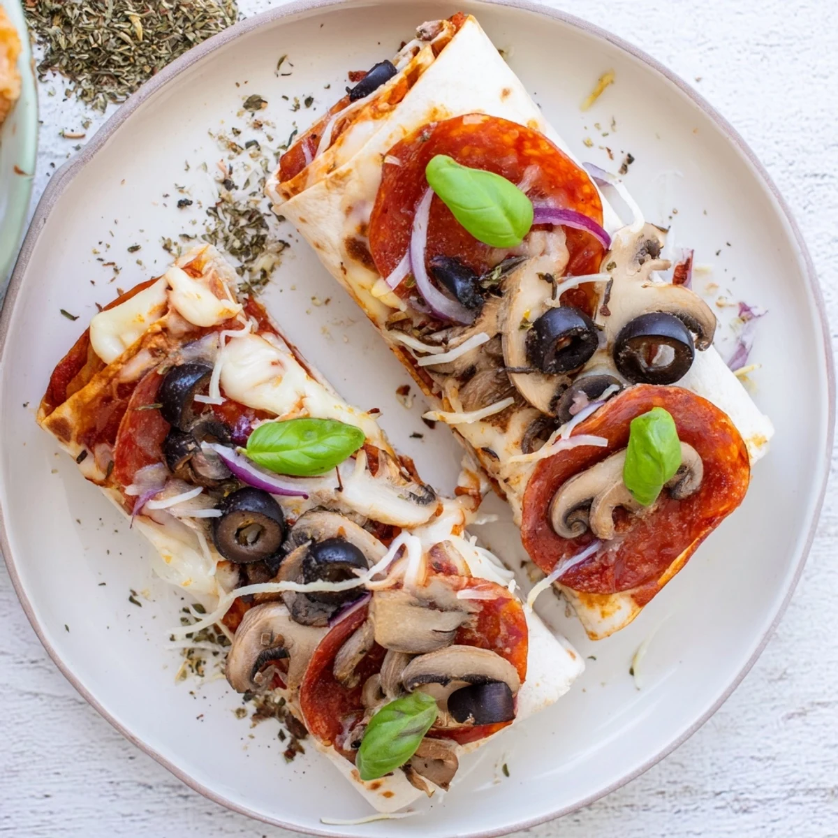 Golden-brown Cheesy Tortilla Pizza Wrap with melted mozzarella and pepperoni, ready to enjoy.