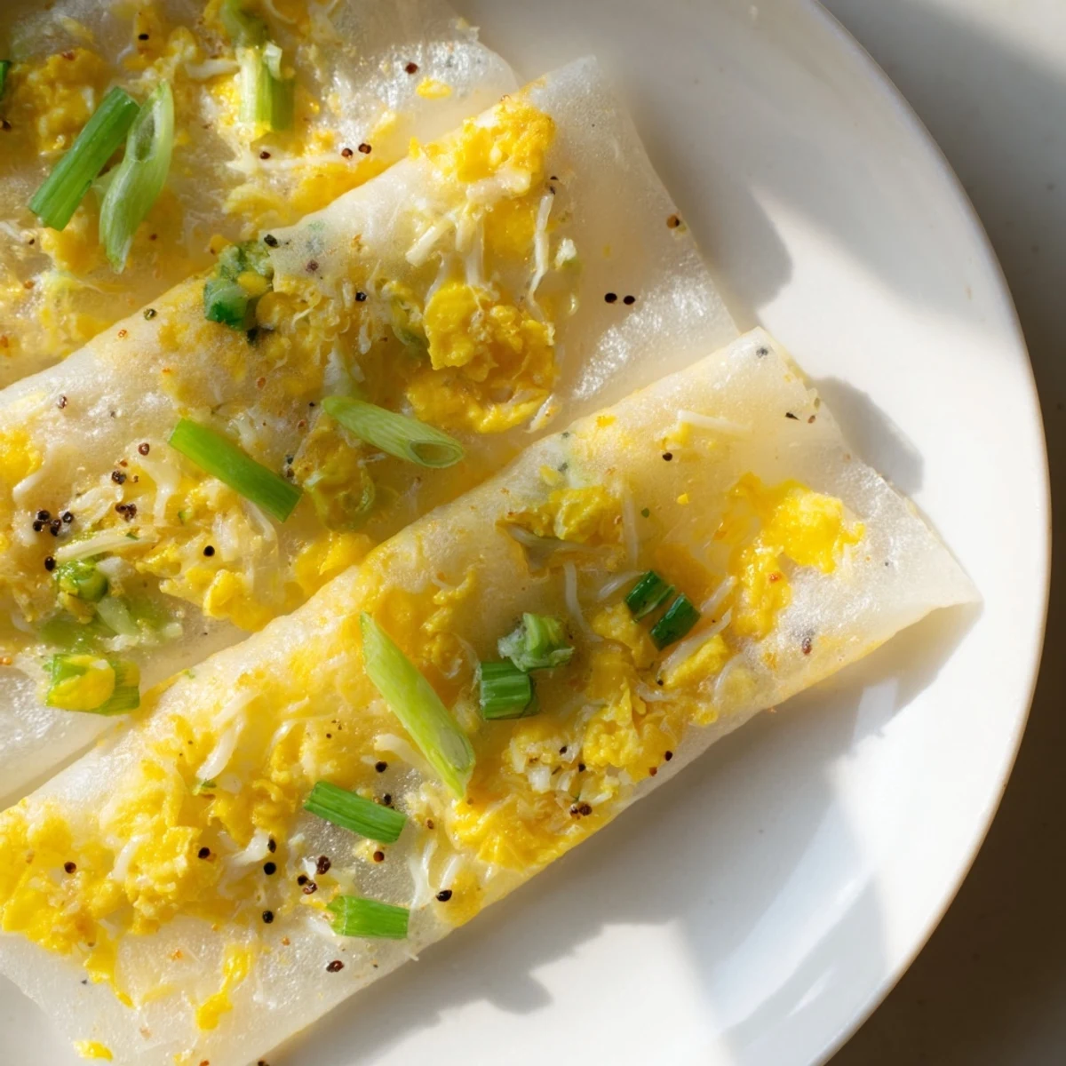 Golden, crispy Rice Paper Egg & Cheese Fold: a delicious, cheesy snack for breakfast or lunch.
