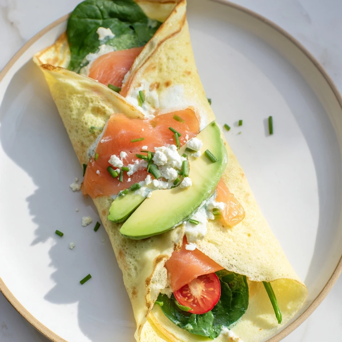 Golden-brown Blender Egg Crepe Wrap, thin and delicate, awaits savory fillings for brunch.