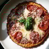 Enjoy the savory, gluten-free ground beef pizza base, baked until bubbly, with pepperoni and melted cheese.