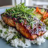 Quick teriyaki salmon bowl with glazed fillets, fresh vegetables, and fluffy jasmine rice. A vibrant, easy dinner perfect for busy weeknights.