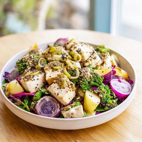 A healthy Chicken and Apple New Years Luck Salad ready to eat, featuring fresh apple slices and creamy dressing.