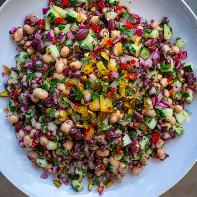 Enjoy a refreshing scoop of the savory Dense Bean Salad with Dubai Chocolate Notes, a fantastic vegetarian option.