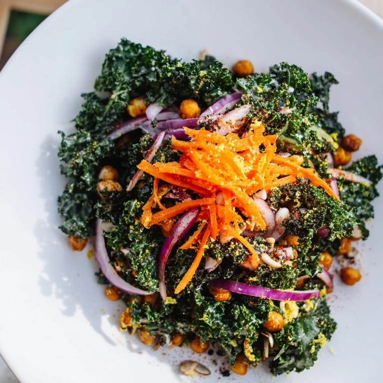 A colorful and delicious Kale Salad with roasted chickpeas, perfect for a vegan meal.