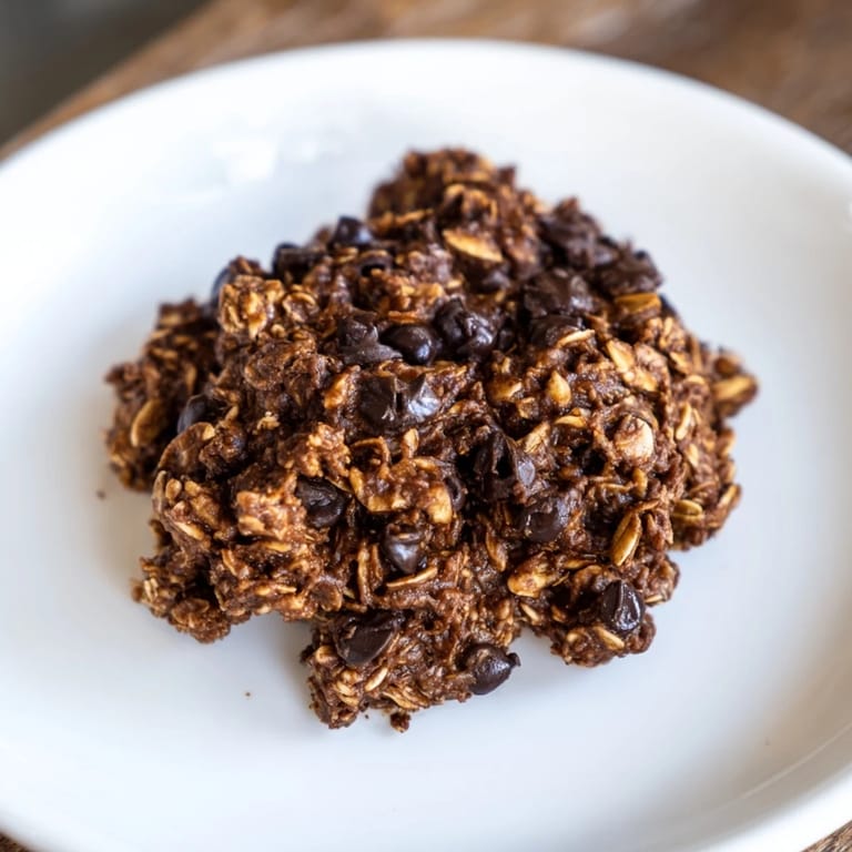 Freshly baked Chocolate Oatmeal Breakfast Cookies, featuring a wholesome, dairy-free treat, perfect for breakfast.