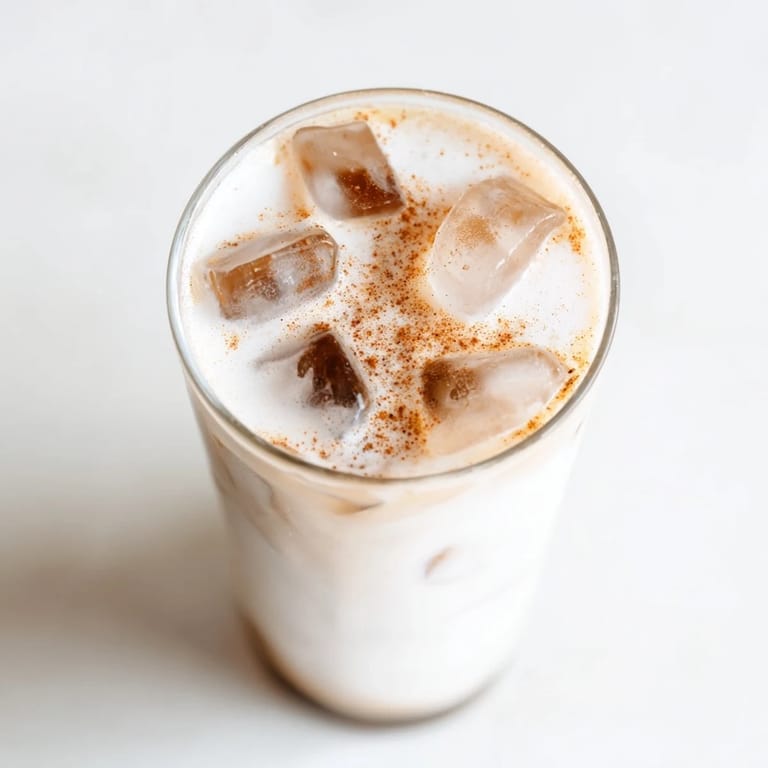 This chilled Proffee Power Blend features a swirl of coffee and creamy protein shake, ready to enjoy.